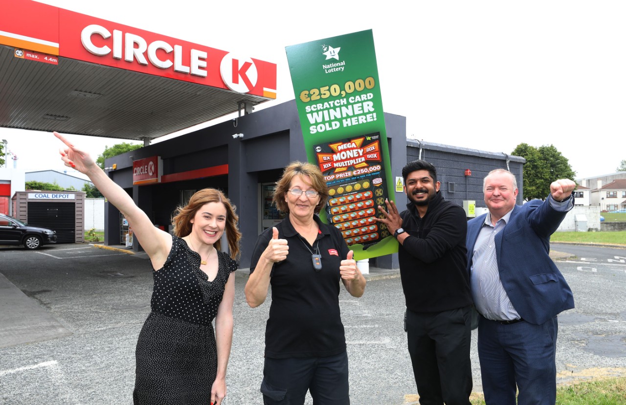 Ljilyjana Pavlovic, (centre left) Manager, CircleK with Manu Jones staff at the Circle K Kilnamanagh petrol station on the Maybury Road in Tallaght pictured with John Williams (right) Area Manager, National Lottery and Sarah Orr, National Lottery celebrating after it was announced that their store sold a top prize-winning Mega Money Multiplier scratch card worth €250,000. Pic: Mac Innes Photography
