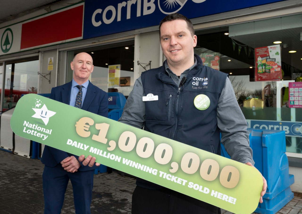 NO REPRO FEE: 3rd March 2022. Kevin Heffernan (right) Corrib Oil Store Manager pictured with Conor Donoghue of the National Lottery at the Corrib Oil Spar store on the Castlebar Road in Westport where celebrations kicked off after it was announced that their shop sold the €1 million winning ticket for Tuesday’s (1st March) 2pm Daily Million draw. Pic Mac Innes Photography