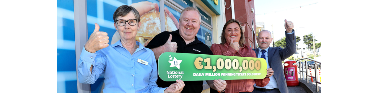 NO REPRO FEE: 27th September 2021. Delighted Centra shop owners Shane and Siobhan Murphy (centre) pictured with assistant Trish Montgomery and Michael Molloy of the National Lottery outside their shop in Rosslare as confirmation came in that they had sold Friday night’s Daily Millions top prize.  Pic Mac Innes Photography 
