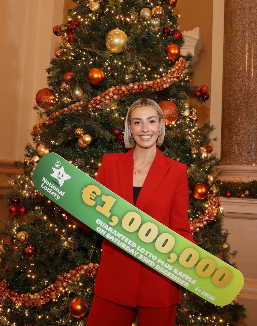 NO TREPRO FEE. 21st Dec 2023. Lotto presenter Bláthnaid Treacy was pictured in the festive surroundings of the College Green Hotel ahead of the Saturday 23rd December Lotto draw which will see one Lotto player scoop a GUARANTEED to be won €1 million Lotto Plus Raffle prize. Pic: Photography by Mac Innes Photography. 