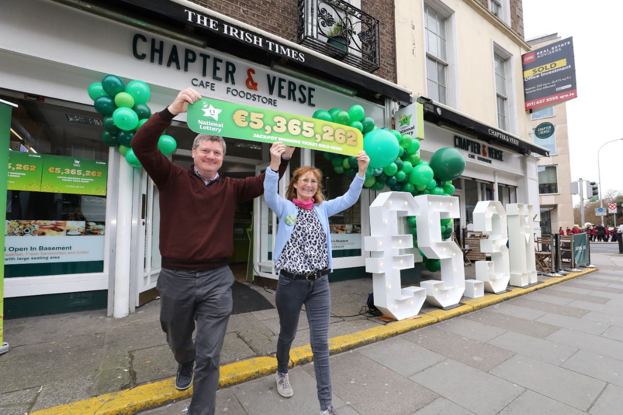 Staff from Chapter & Verse, Lower Lesson Street, Dublin 2 celebrate after it was confirmed that they sold Saturday’s Lotto jackpot ticket worth €5,365,262.