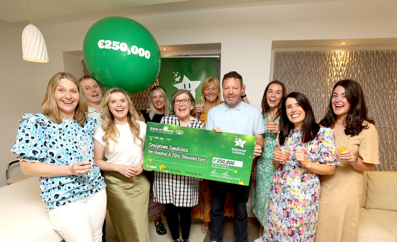 The Craigtown syndicate were pictured today celebrating in Lotto HQ collecting their €250,000 cheque after winning the Lotto Plus 2 top prize on Saturday 27th May with Ronal Cooney (centre) Draw Manager, National Lottery. (Photo by Mac Innes Photography