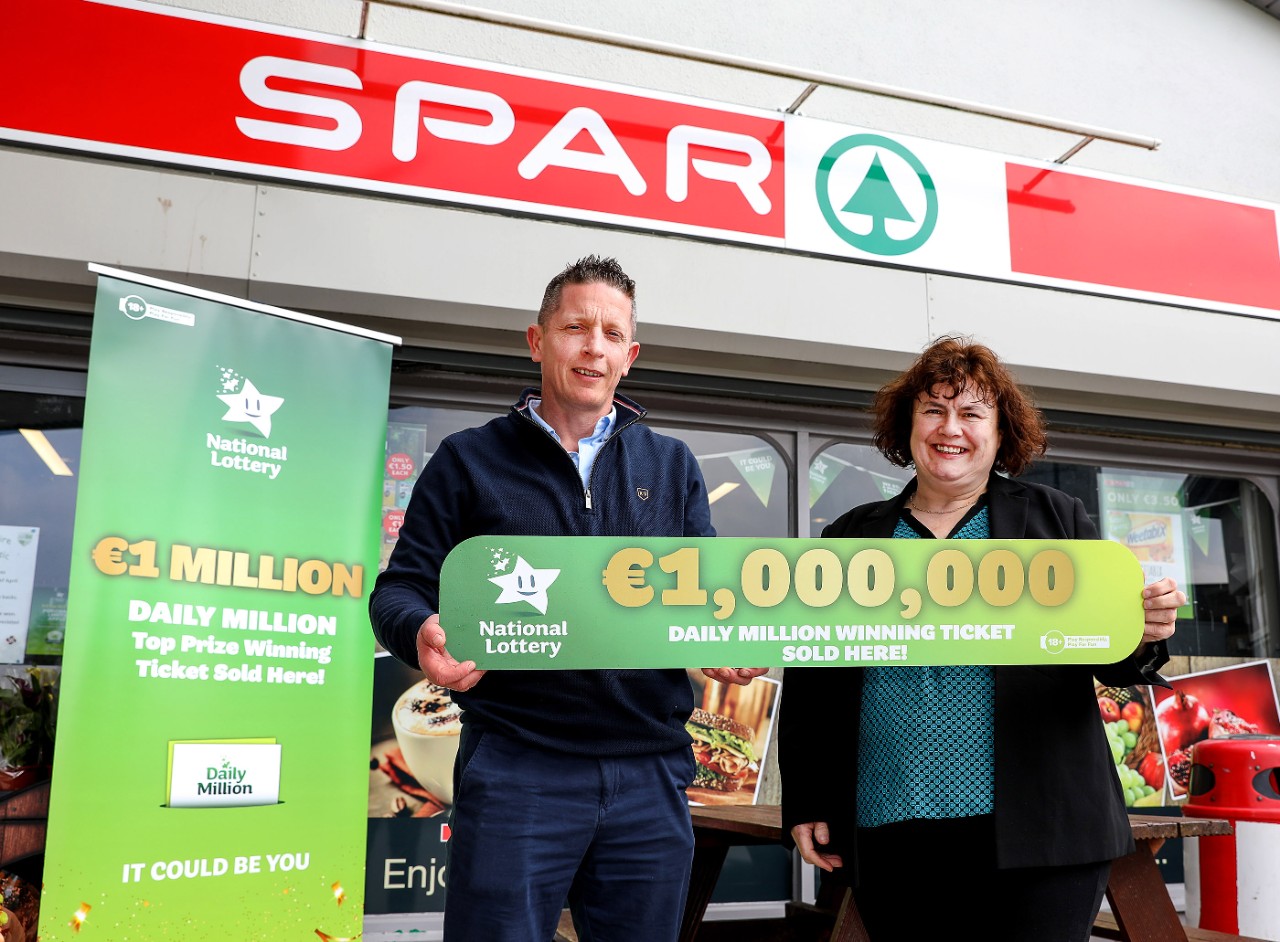 Michael O'Brien (Owner) and Mary Grace (Field Sales Representative, National Lottery)Michael and Owner of Spar in Borrisokane, is pictured celebrating with and Mary Grace (Field Sales Representative, National Lottery) as their store was revealed as the winning location for last Saturday’s 2pm Daily Millions top prize ticket worth €1,000,000. Pic: Odhran Ducie / Mac Innes Photography. Celebrations are underway in one small town in Co. Tipperary after it was revealed as the selling location for last Saturday’s 2pm Daily Millions top prize ticket worth €1,000,000. Spar in Borrisokane in Co. Tipperary sold the all-important winning ticket, which is now worth one million euro to one lucky player.